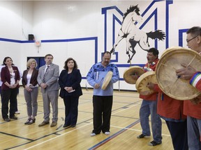 Premier Rachel Notley announced a major modernization for Mistassiniy School in Wabasca on Friday, April 27, 2018. From left to right are Children's Services Minister Danielle Larivee, Premier Rachel Notley, Athabasca-Sturgeon-Redwater MLA Colin Piquette, Northland school board chairwoman Maddy Daniels, and the Bigstone Traditional Drummers who played during the announcement.