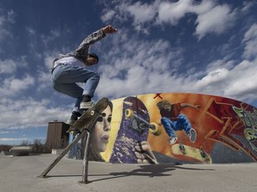 Avery Nosen enjoys the spring-like weather at the Fulton Ravine South skate park in Edmonton on Wednesday, April 18, 2018 .