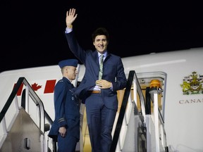 Prime Minister Justin Trudeau arrives in Stansted, England, on Tuesday, April 17, 2018.