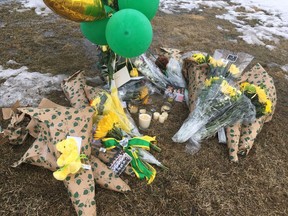 A memorial outside the Stony Plain family home of Parker Tobin. The Humboldt Broncos goalie, 18, was misidentified as alive by officials in Saskatchewan after the crash of the Humbolt Broncos bus on Friday, April 6, 2018. The memorial began to take shape when it was announced on Monday, April 9, 2018 that he had in fact been killed. Jonny Wakefield/Postmedia