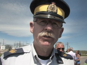 Screen capture of a 2013 video containing RCMP Sgt. Brian Topham in High River. POSTMEDIA ARCHIVE