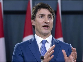 Prime Minister Justin Trudeau speaks during a press conference to discuss his meeting with Alberta Premier Rachel Notley and B.C. Premier John Horgan on the deadlock over Kinder Morgan's Trans Mountain pipeline expansion, in Ottawa on Sunday, April 15, 2018.