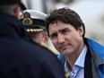 Prime Minister Justin Trudeau meets with Canadian Coast Guard members aboard the Sir Wilfrid Laurier to discuss marine safety and spill prevention, in Victoria on Thursday.
