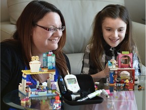 With her diabetes kit in the froeground, Deanna Emberg's seven-year-old daughter Natalie who has diabetes, took seven months with the St. Albert public school board, to get her daughter insulin injections in her school in St. Albert, February 18, 2018. File photo.