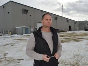 Troy Dezwart, co-founder of Freedom Cannabis Inc., outside his company's cannabis production facility under construction in February at the Acheson Industrial area.