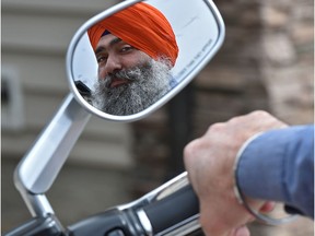 Bhupinder Singh might be the very first Sikh in Alberta to receive a new licence that allows him to ride a motorcycle without a helmet, in Edmonton, May 9, 2018.