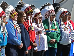Minister of Indigenous Services Jane Philpott (L) with Chiefs before signing an agreement at a public ceremony to celebrate the signing of a landmark First Nations education agreement with the Government of Canada hosted by the four Maskwacîs Cree Nations that marks the official transition of true local control of education to Maskwacîs Cree, May 18, 2018.