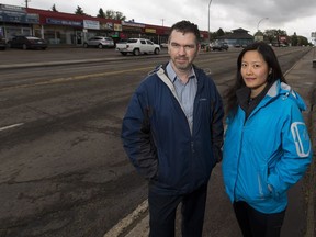 Miles Berry, left, and Angela Mao, members of the Greater Hardisty Community Sustainability Coalition on 101 Avenue on Wednesday, May 30, 2018, want to see walkable improvements to 101 Avenue to support the businesses and encourage more residential density along the avenue,. They are hoping Edmonton will start with a series of temporary improvements this summer.