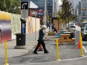 Yellow plastic barriers could return to Jasper avenue as a safety measure.