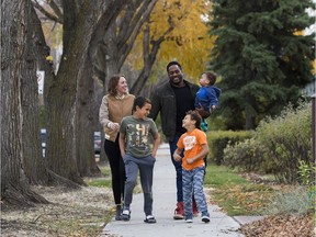 Chile Lipscombe, Tripp Lipscombe, Jesse Lipscombe, Julia Lipscombe and Indiana Lipscombe pose for a photo outside their home in Edmonton on Thursday, Oct. 12, 2017.