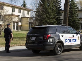 Edmonton police at the Strathearn Heights Apartments complex where Bigué Ndao, 33, was stabbed to death on Monday, May 7, 2018. Her estranged partner, Ahamdo Mbaye, has been charged with second-degree murder.