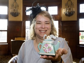 Shelley Hoke displays the parting wedding gift she received following the royal wedding viewing party at the Fairmont Hotel Macdonald, in Edmonton Saturday May 19, 2018.