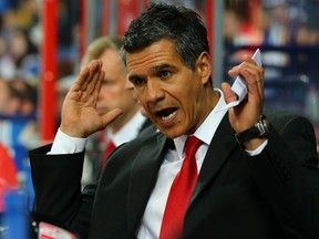 Manny Viveiros, head coach of Austria gives instructions during the IIHF World Championship group H match between Austria and Germany at Hartwall Areena on May 8, 2013 in Helsinki, Finland.