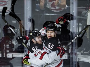 Colton Parayko and Connor McDavid of Canada celebrate after scoring their first goal during the quarterfinal match Russia vs Canada of the 2018 IIHF Ice Hockey World Championship at the Royal Arena in Copenhagen, Denmark, on May 17, 2018.