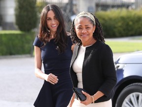 The day before: Meghan Markle and her mom Doria Ragland arrive at Cliveden House hotel in the village of Taplow near Windsor on May 18, 2018, the eve of her wedding to Britain's Prince Harry.