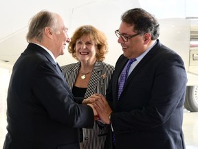 His Highness the Aga Khan, left, is greeted by Lois Mitchell, Lieutenant Governor of Alberta, and Calgary Mayor Naheed Nenshi upon arrival in Calgary Monday evening. Supplied photo, courtesy organizers of Aga Khan diamond jubilee celebrations in Calgary. May 7, 2018.