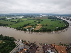 Barnston Island, which is under an evacuation alert due to potential flooding, is seen in an aerial view along the Fraser river, in Surrey, B.C., on Wednesday May 16, 2018.