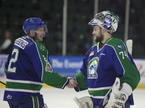Colby Sissons of the Swift Current Broncos shakes hands with goaltender Stuart Skinner on May 9, 2018, following a 1-0 victory over the host Everett Silvertips in Game 4 of the Western Hockey League final. Robert Murray/Western Hockey League.