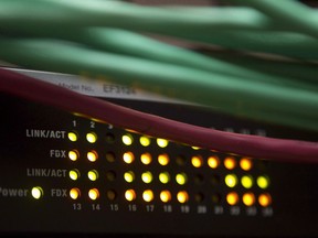 Lights on an internet switch are lit up as with users in an office in Ottawa, on February 10, 2011. Canada???s competition watchdog is inviting public comment about broadband internet providers, including whether there are lessons the can be learned from how other countries manage and regulate their markets. It???s seeking initial submissions by Aug. 31 and aims to publish a final report next year.THE CANADIAN PRESS/Adrian Wyld