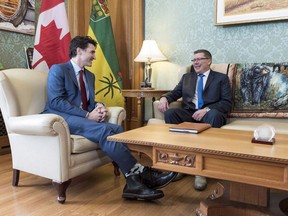 Prime Minister Justin Trudeau and Saskatchewan Premier Scott Moe meet at the legislative building in Regina on March 9, 2018.