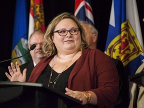 Alberta Health Minister Sarah Hoffman answers questions during a federal, provincial and territorial health ministers' meeting in Toronto on Tuesday, October 18, 2016. Alberta's abortion clinic bill has moved one step closer to being passed following a debate session that saw opposition United Conservatives walk out of the chamber en masse five more times to avoid casting a vote.