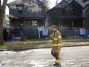 Two houses on 104 Street just north of 107 Avenue that were listed for sale received extensive damage in a fire on Thursday May 3, 2018.