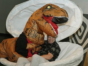Murray Utas (Fringe Festival Artistic Director) hatches from a dinosaur egg during the theme reveal for the 37th Edmonton International Fringe Theatre Festival that will take place in Edmonton from August 16-26, 2018. This year's festival is named "Fringe "O" Saurus Rex", with a theme that will be complimented by found fossils, dinosaur discovery and paleontology prowess. (PHOTO BY LARRY WONG/POSTMEDIA)