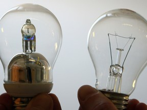 AACHEN, GERMANY - JULY 14: Image shows a new designed halogen lamp of Philips (L) and a usual lightbulb (R) pictured at Philips on July 14, 2008 in Aachen, Germany. (Photo by Patrik Stollarz/Getty Images)