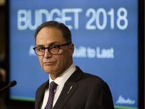 Alberta Finance Minister Joe Ceci speaks during a press conference about Budget 2018 in the Alberta Legislature in Edmonton, on Thursday, March 22, 2018.