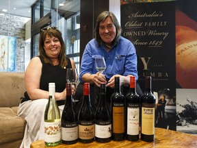 Wine columnist Juanita Roos, left, and Jane Ferrari of Yalumba winery hold glasses of viognier wine during an interview at Mettera Hotel in Edmonton, on Tuesday, May 15, 2018.