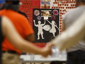 A memorial for Serenity and other lost children is seen as dancers circle Cree singers during the 11th and final Blanket of Remembrance Round Dance at Edmonton Intercultural Centre in Edmonton, on Friday, May 18, 2018.