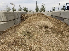 A pile of wood mulch is seen at Kennedale Eco Station in Edmonton, on Thursday, May 24, 2018. Residents can pick up the mulch for free. Photo by Ian Kucerak/Postmedia For a Dustin Cook story running May 26, 2018.