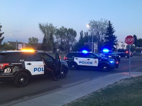 Investigators cordoned off a stretch of 144 Avenue near 92 Street on May 21, 2018, after a young boy was struck by a vehicle. Police at the scene said the boy was believed to be six years old.