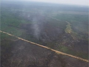 An aerial shot of a wildfire about 10 kilometres south of the hamlet of Janvier. The fire is listed as being held by Alberta Wildfire as of 10 a.m. Saturday. (Alberta Wildfire)
