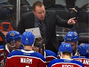 Edmonton Oil Kings head coach Steve Hamilton talks to his players as they palyed the Brandon Wheat Kings during WHL action at Rogers Place in Edmonton, October 6, 2017.