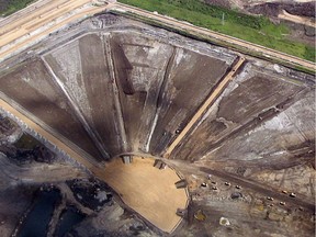 A company handout photo shows a tailings facility at Shell Canada's Muskeg River mine in northern Alberta. The Alberta Energy Regulator says it has approved tailings pond management plans for the former Shell Canada oilsands mines in northern Alberta but has identified "deficiencies" in the plans that must be addressed within four years.