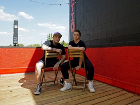 Levi Biddlecombe (left) and Adrienne Livingston, owner-operators of the Why Not Cafe & Bar in Edmonton, have been issued a non-compliance order by the City of Edmonton that prevents them from serving customers on their outdoor patio.