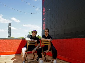 Levi Biddlecombe (left) and Adrienne Livingston, owner/operators of the Why Not Cafe and Bar in Edmonton, have been issued a non-compliance order by the City of Edmonton that prevents them from serving customers on the outdoor patio of their business.