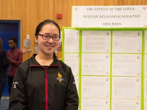 Qin Tong, a Grade 10 student at Old Scona Academic High School poses with her project at the Edmonton Regional Science Fair. Tong will compete at the Canada-Wide Science Fair in Ottawa May 12-19. (Photo Provided)