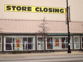 Signs advertise the closing of a Sears store in Chicago, Illinois. The store, which opened in 1938, is the city's last remaining Sears store.