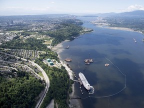 A aerial view of Kinder Morgan's Trans Mountain marine terminal, in Burnaby, B.C., is shown on Tuesday, May 29, 2018. The federal Liberal government is spending $4.5 billion to buy Trans Mountain and all of Kinder Morgan Canada's core assets, Finance Minister Bill Morneau said Tuesday as he unveiled the government's long-awaited, big-budget strategy to save the plan to expand the oilsands pipeline.THE CANADIAN PRESS Jonathan Hayward ORG XMIT: JOHV102