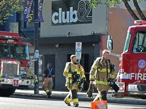 Fire investigators on the scene of a early morning suspicious fire that damaged a Whyte Avenue nightclub, Club 82, near 106 Street in Edmonton, May 28, 2018.