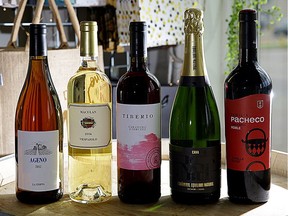 A selection of five bottles of wine that would make a perfect gift for Mother's Day due to their quality and because they were made by wineries led by daughters of winemakers.