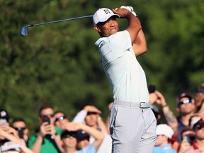 Tiger Woods plays his tee shot on the 13th hole during the second round of the 2018 Wells Fargo Championship at Quail Hollow Club on May 4, 2018