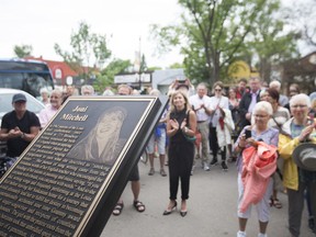 A plaque of Joni Mitchell is shown during a plaque unveiling to tribute artist Joni Mitchell in Saskatoon, SK on Sunday, June 10, 2018.