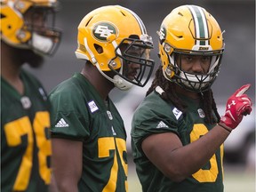 Jason Carr (78), left, Nick Usher (75) and Zachary Barnes (91) take part in an Edmonton Eskimos practice at Commonwealth Stadium in Edmonton on Monday, June 4, 2018.