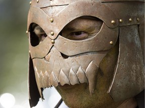 Dressed as an orc, assistant superintendent of Elk Island Catholic Schools Paul Corrigan takes part in a mythic battle at Our Lady of the Angels school as part of a practice exam for their Grade 8 science final in Fort Saskatchewan on Thursday, June 7, 2018.