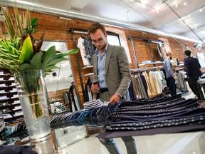 Brent Colman checks out items during the Stylin' 9-5 event at The Helm Clothing.