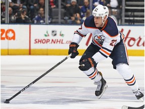 TORONTO, ON - DECEMBER 10: Milan Lucic #27 of the Edmonton Oilers skates with the puck against the Toronto Maple Leafs during an NHL game at the Air Canada Centre on December 10, 2017 in Toronto, Ontario, Canada. The Maple Leafs defeated the Oilers 1-0.