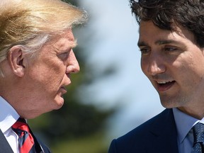 LA MALBAIE , QC - JUNE 08:  US Donald Trump (L) and Canada's Prime Minister Justin Trudeau (R) stand together during the Welcome ceremony on the first day of the G7 Summit, on 8 June, 2018 in La Malbaie, Canada.